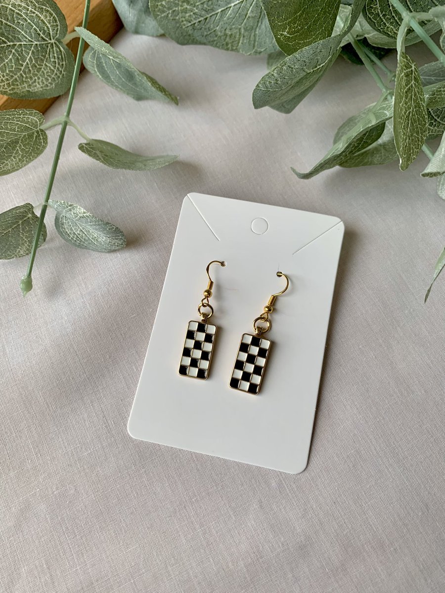 "Checkered Charm Earrings" are only $10 and available in every color still!! 

Grab them with the link below 🤍✨