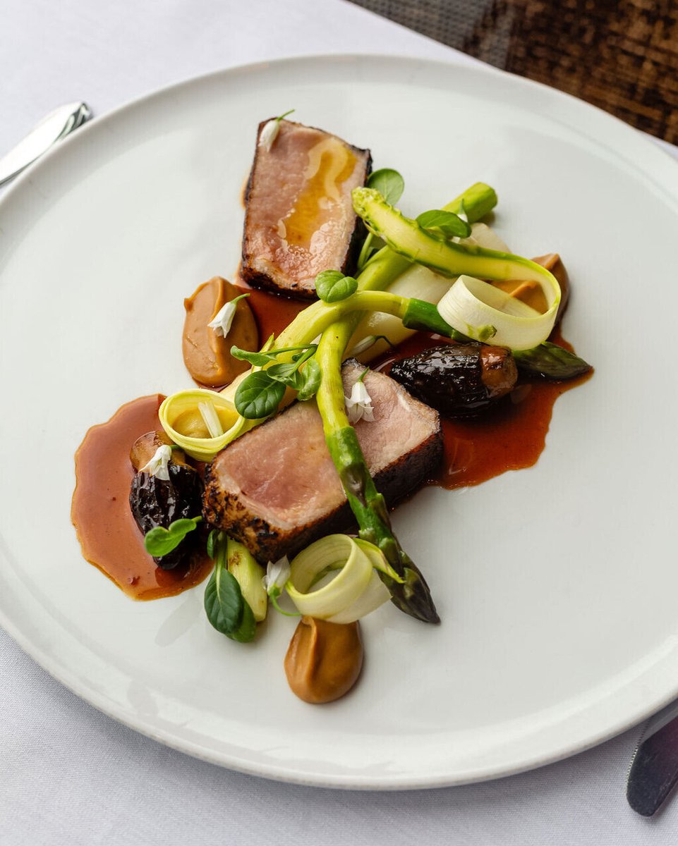 Heirloom Iberian Pork Loin is a premium cut of meat known for its exceptional quality and rich flavor. 
Our chef pairs these flavors with earthy flavors of black garlic and stuffed morel mushrooms.