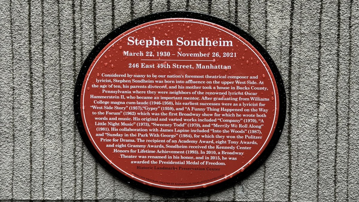 Outside Stephen Sondheim’s apartment in New York City on a rainy Memorial Day, paying homage to the great man. Photo of red plaque, recently installed @SondheimSociety @craigglenday