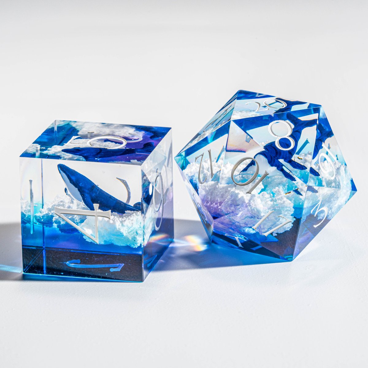 urwizards's tweet photo. Today, we're excited to give away our newly arrived Dreamy Whale Dice Set on our website ! 😍 
To win: 
🐳Like this post 
🐋Repost using #urwizards
🐳Answer this question: Which whale design do you like more? The Light Blue or the Afterglow (Inspired by the deep blue of the ocean at sunset, contrasting with the subtle orange and purple gradient of the sky)？
🐋🐳Happy winning🐋🐳