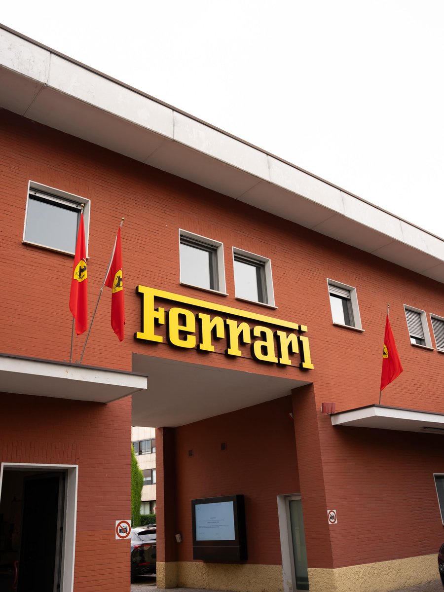 F1's tweet photo. Charles’ victory flag is now flying proudly outside Maranello 🏁

#F1 #MonacoGP https://t.co/nmv5kKI1Hg