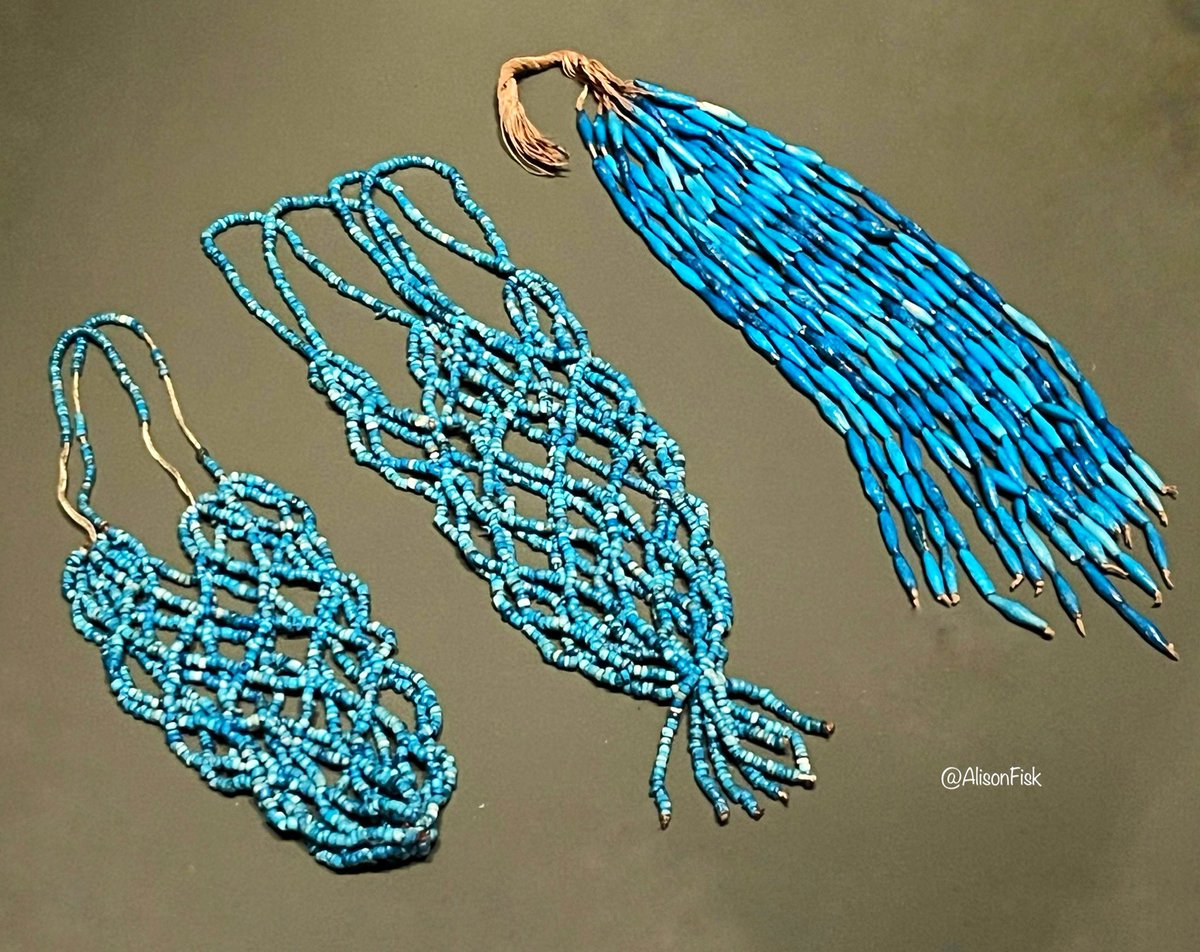 Wow, these ancient Egyptian faience bead bags and fly-whisk are such a vibrant blue they look like they were made yesterday, rather than some 3,600 years ago!

The two small bead bags would have been used to hold and suspend a pot or container.

Excavated from the burial of the