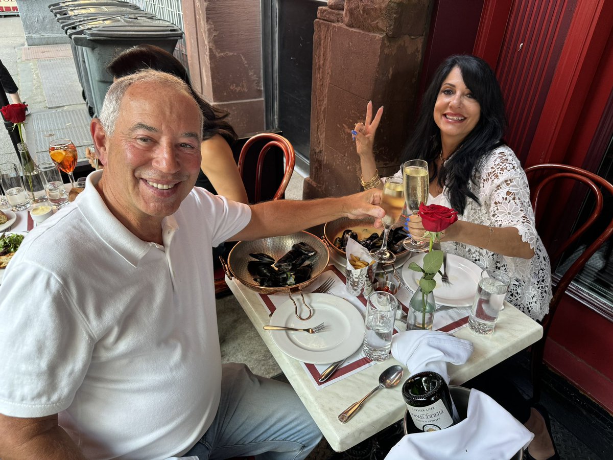 Happy Memorial Day! We think it’s the perfect day to come celebrate @ @mannysbistrony with some delicious mussels & @maison_pierre_sparr_succ Cremant d’Alsace. Just like the lovely Barbara & Neal are doing here. Salut! 🥂 #mannysbistro #happymemorialday #memorialday #cheers #nyc