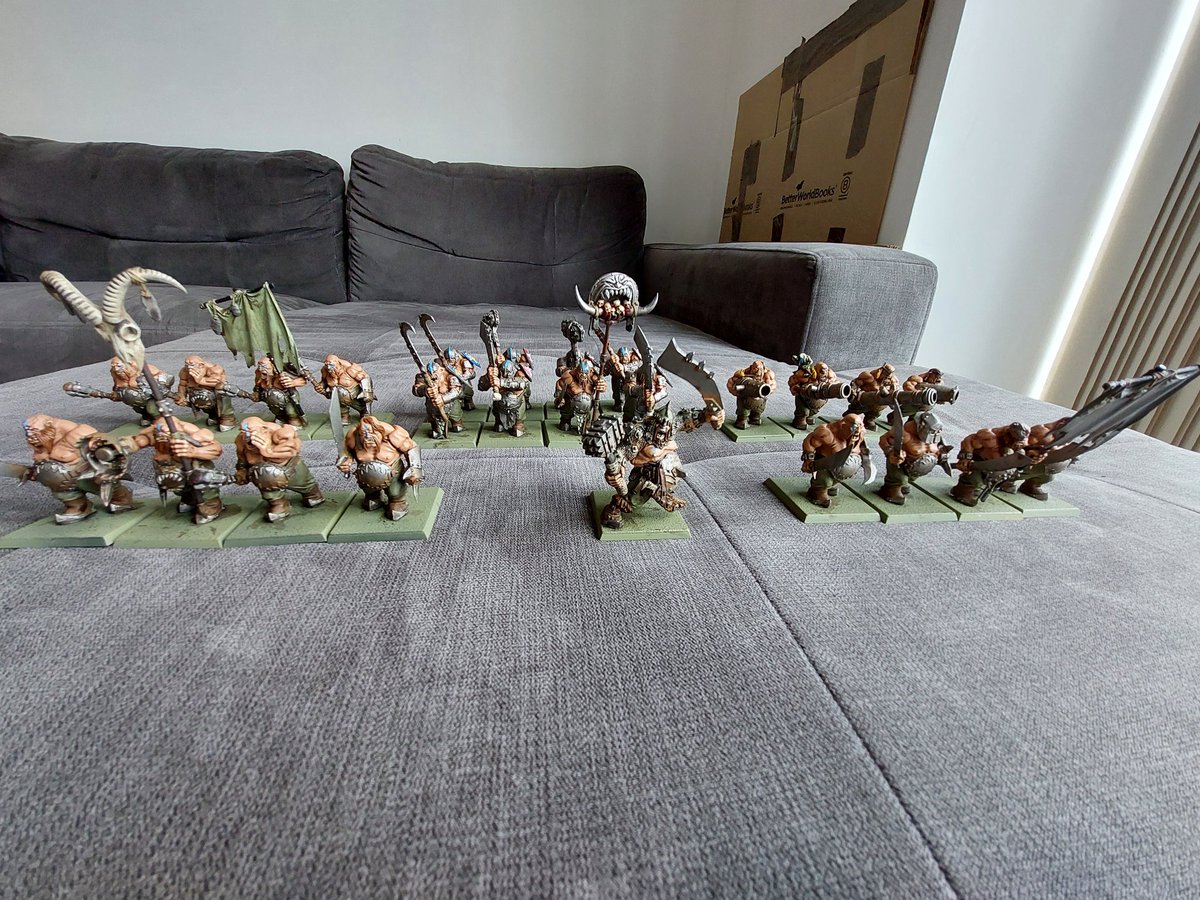 And they're done! A full regiment of ogre ironguts, complete with snazzy shoulder shields so they can display their many victories. Also, an army progress shot - not far to go til we're finished! #WarhammerCommunity #TheOldWorld