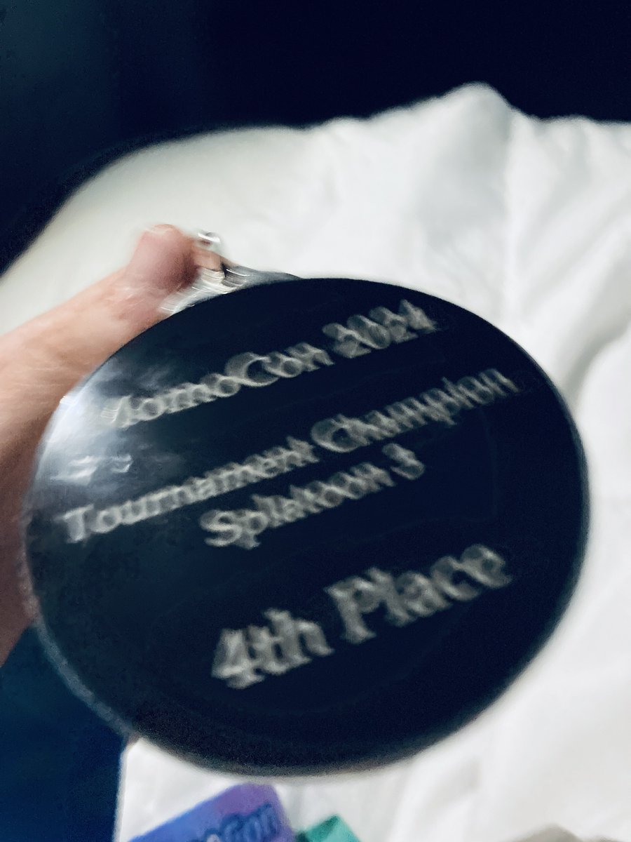 they misspelled first on our medals but we totally won the Momocon '24 Splatoon 3 competitive tournament and all we got were these cool medals and some nice stickers and great memories and also cripplingly sick