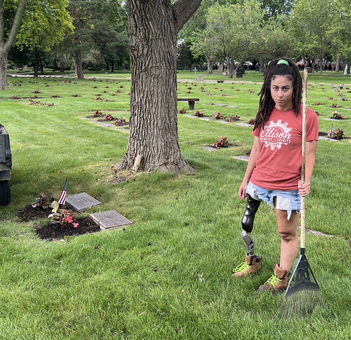 At the cemetery this morning I met this young woman placing the remaining flags on the graves of our veterans.