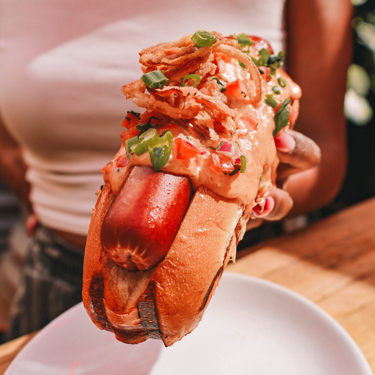 Do you know what pairs perfectly with Memorial Day Weekend and an Ice Cold Beer? Our new #BeerParkLV Wagyu Dog! Topped with cheese sauce, pico de gallo, crispy onions and green onions. 🌭