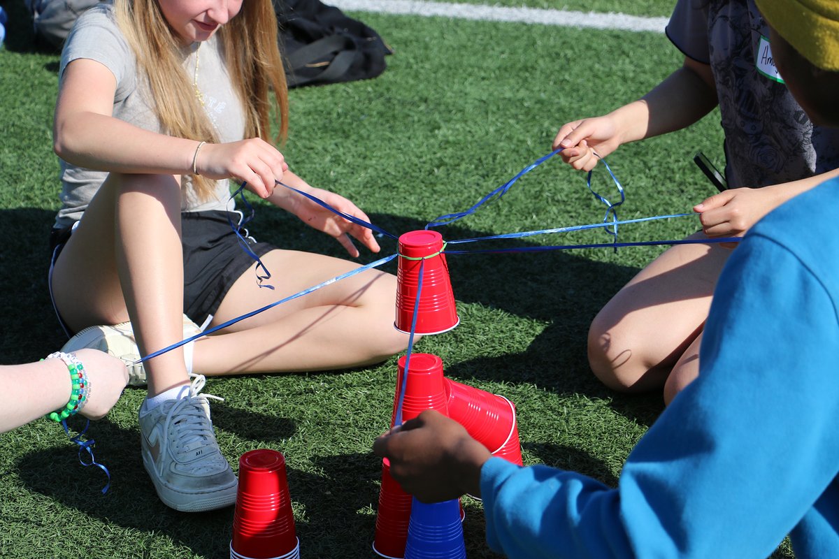 isd199's tweet photo. Groups of #Simley freshmen played teambuilding games with Link Leader student mentors during Freshman Olympics. The games helped connect students and solidify positive relationships ahead of the end of the school year. ARTICLE: https://t.co/dn44BurekE https://t.co/yFMFEEJRYi