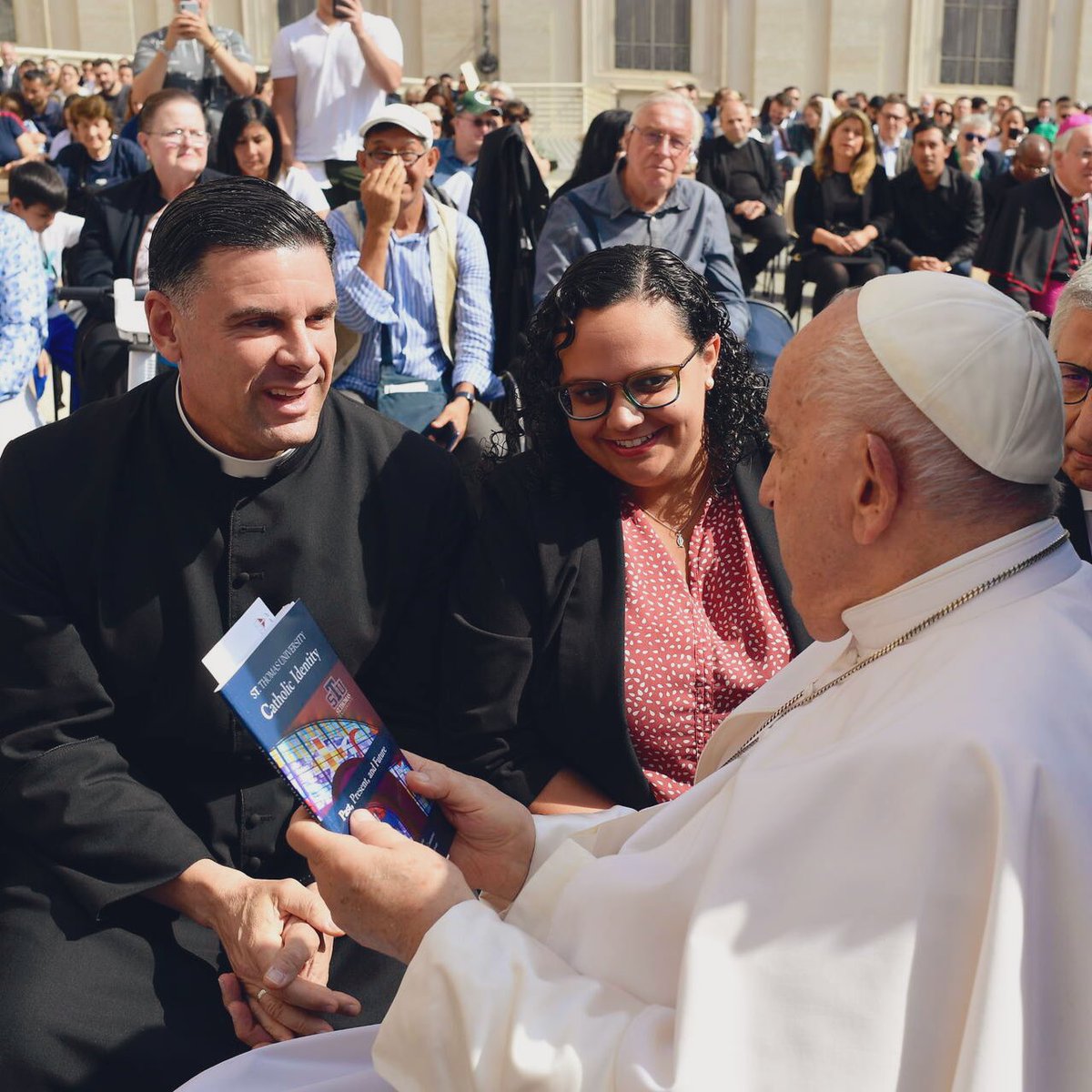 Blessed to greet the Holy Father with US delegate Isabelle Seiglie and present the @StThomasUniv @StThomasLaw Catholic Identity and Student Prayer books. Pope Francis listened to our @CatholicMiami STU Catholic Identity process and gave us a blessing for all in the STU