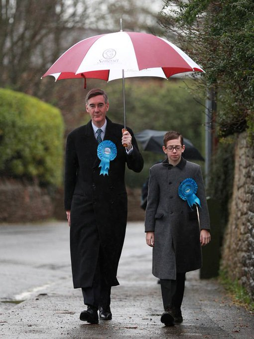 formal_the's tweet photo. I'm becoming more and more convinced that Jacob Rees-Mogg is just two kids in a trench coat https://t.co/6D8ws1NMs2