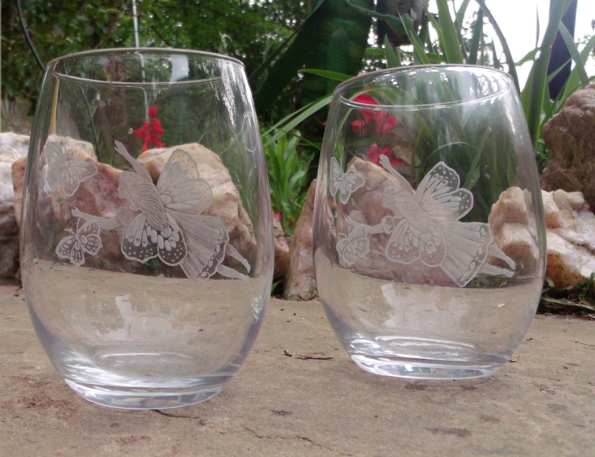 Fairy and butterfly stemless wine glass set of two clear stemless wine glasses clearglasses hand engraved tuppu.net/4931f6eb #love #dragoncore #fantasyart #tattooglass #UniqueGlasses