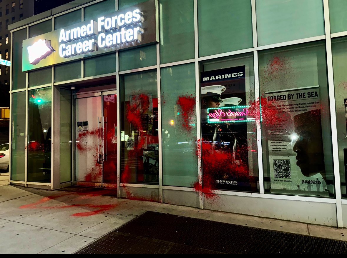 Palestine activists target Armed Forces Career Center on MEMORIAL DAY. Activists splattered red paint over the buildings windows and covered posters of soldiers with ‘Gaza’ and ‘Rafah’ graffiti in Brooklyn, NYC.