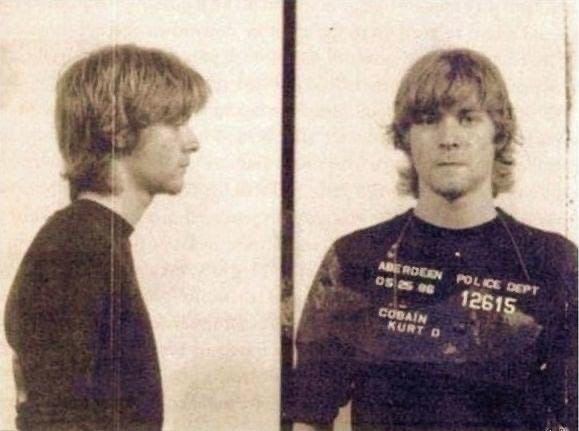 VisionaryVoid's tweet photo. The photo shows 19-year-old Kurt Cobain arrested for "God is gay" graffiti https://t.co/GmJCDx266V