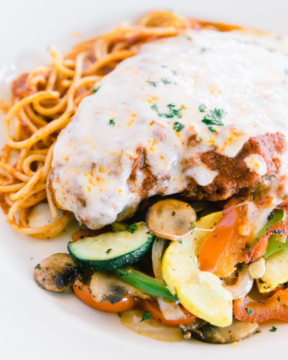 Dive into a crispy, cheesy delight that'll make your heart sing louder than an Italian serenade 🎶 - Chicken Parmesan at #DiCiccos #OldTownClovis! It's not just food; it's amore on a plate ❤️. Swing by and fall in love at first bite 😍 #TasteOfItaly #Yummy