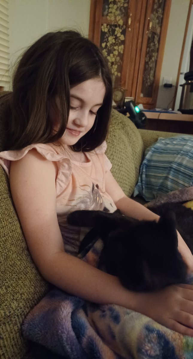 This was my daughter the other night holding and taking to the cat. 
"I promise sweet boy, I will not let you fall because I love you so much and that would hurt you so bad!" He was just looking at her the whole time. 🥹