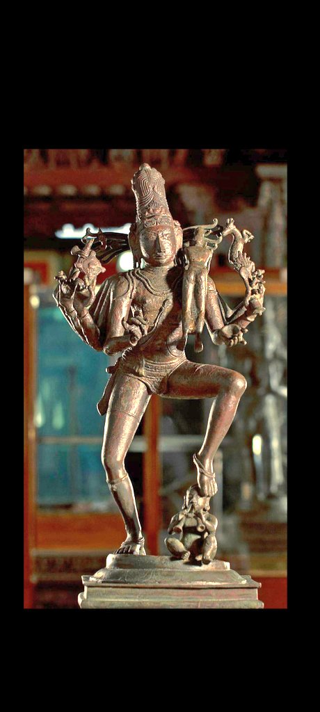 Sati Tandava Shiva, where ashtabhuja Shiva is carrying the body of Sati on His shoulder. 13th century Kerala bronze.