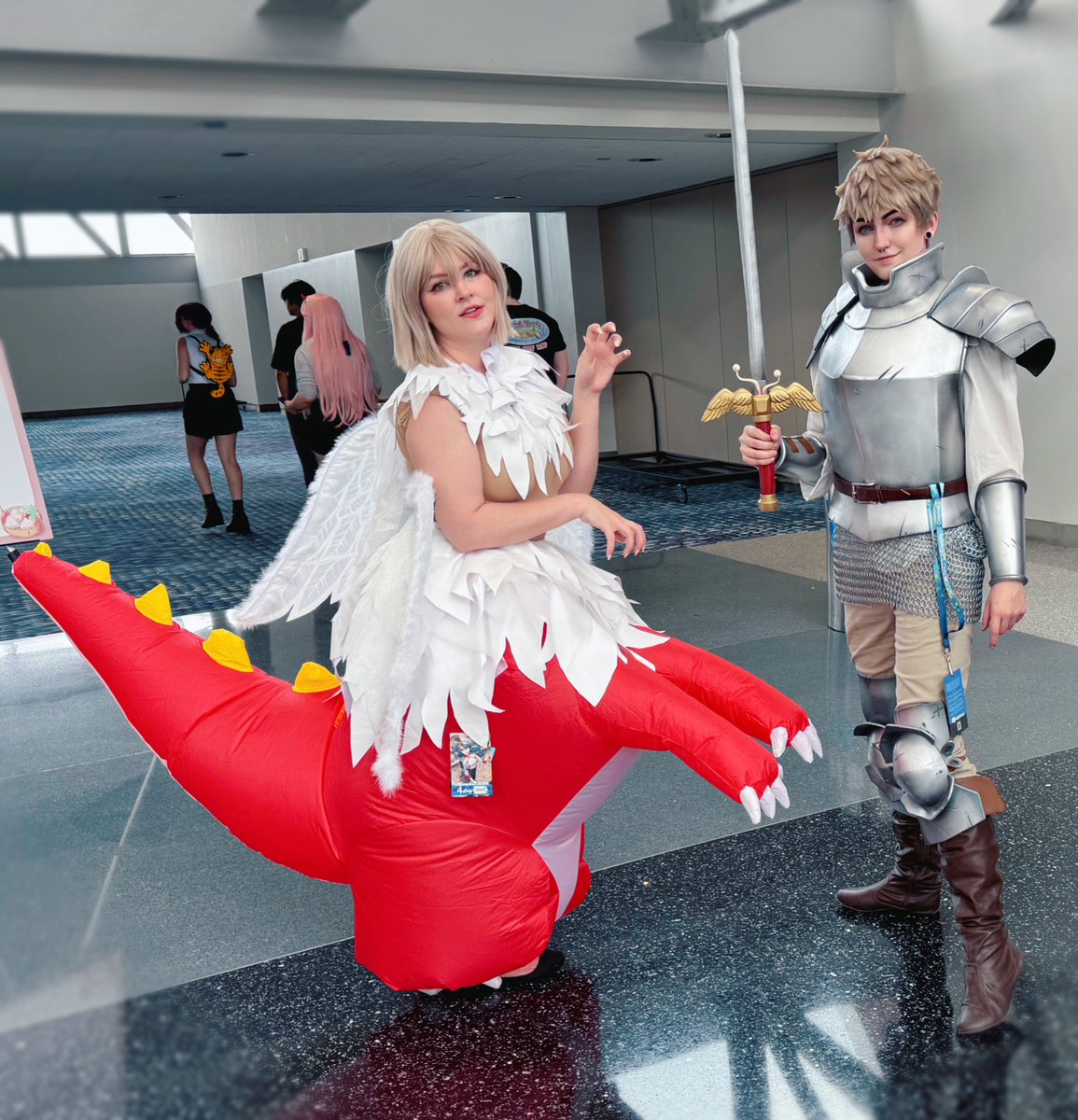 Okay but my laios found inflatable dragon Falin at MomoCon 😭♥️💀