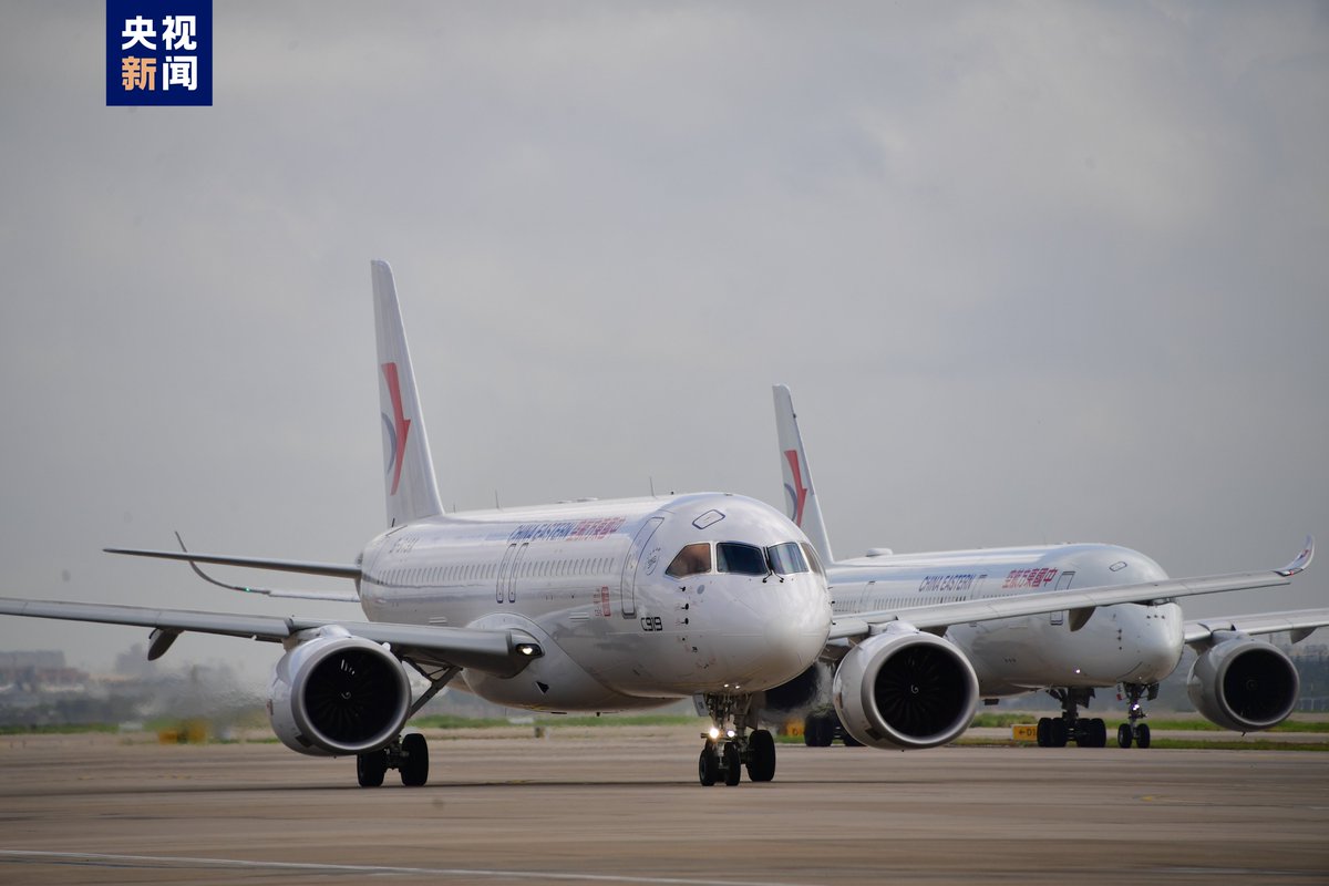 PDChina's tweet photo. #OnThisDay: May 28 marks the first anniversary of China's homegrown #C919 jetliner's commercial operation. One year on, the C919 fleet has served nearly 300,000 passenger trips in over 2,100 domestic flights, accumulating more than 6,000 safe operation hours. https://t.co/UtG0nOHjOx