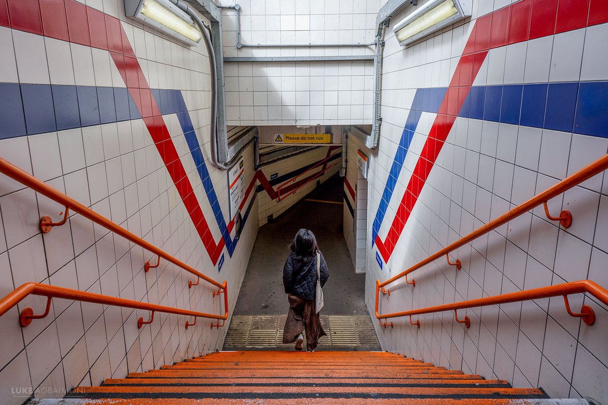 Stripes - Willesden Junction

Photography of colourful lines looking down the stairs at Willesden Junction London Underground station. These must be the original Network South East colours.