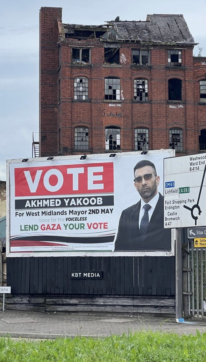 Lend Gaza Your Vote says Akhmed Yakoob’s electoral campaign billboard in front of a dilapidated building in Birmingham, UK.