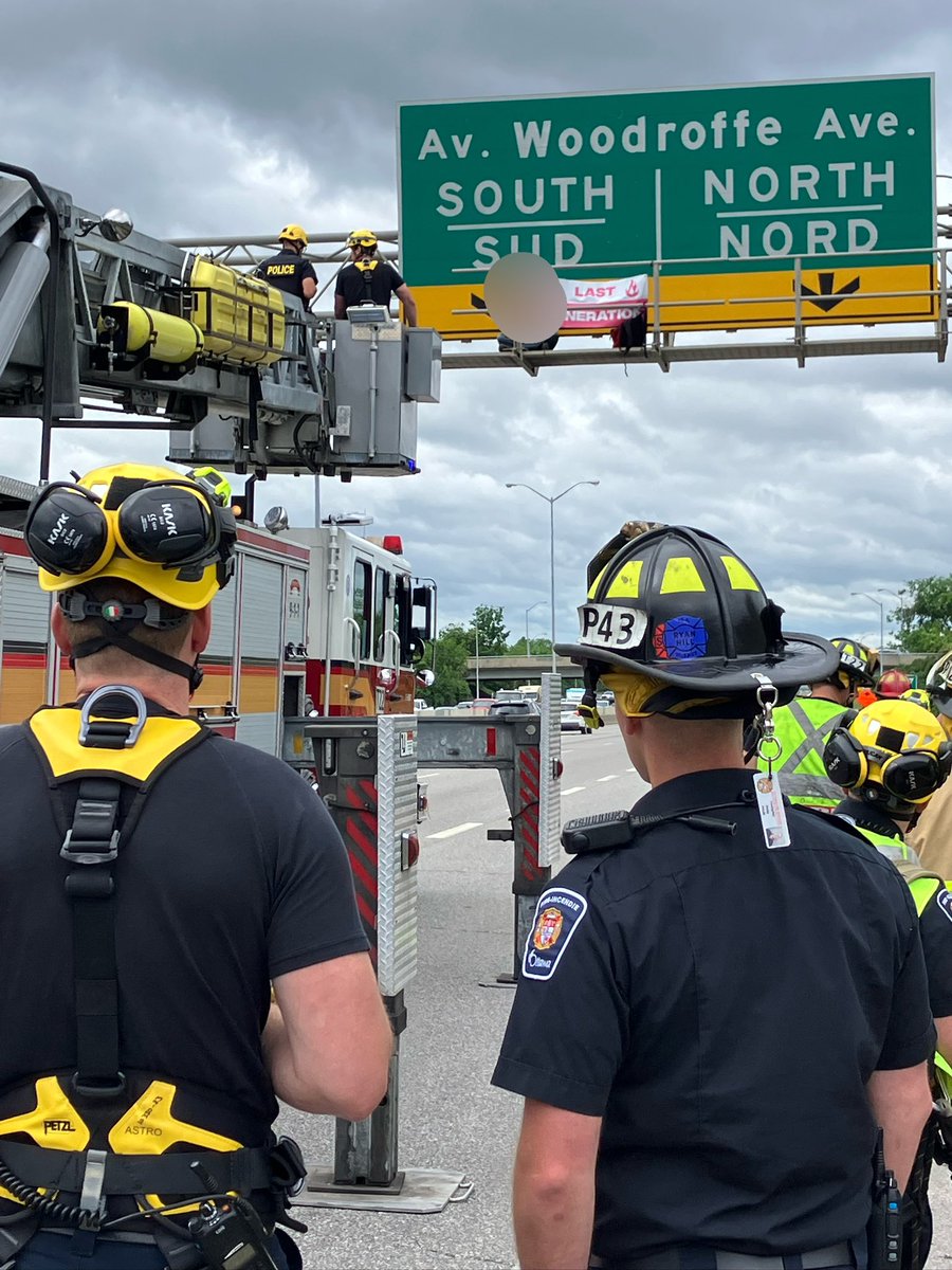 Our Rope Rescue Team is on scene with our partners from <a href="/OPP_ER/">OPP East Region</a> on the 417W &amp; Woodroffe Ave for an activist that has climbed a sign above the highway. 

There are other activists climbing other signs in the area that we are also attending. #OttNews 

<a href="/Ottawa_Traffic/">Ottawa_Traffic</a> <a href="/OPP/">Ontario Provincial Police</a>