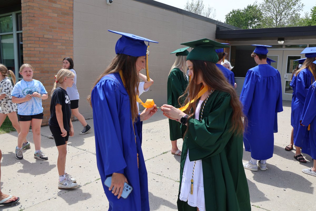 MidlandPS's tweet photo. Graduates from #DowHighChargers and #MidlandHighChemics walked the halls of their former Elementary Schools on Friday. Students from each building “clapped on” & threw confetti for the Chargers and Chemics adorned in their gowns. #MidlandPublicSchools #Graduation #GraduationWalk https://t.co/POAqPsxnMh