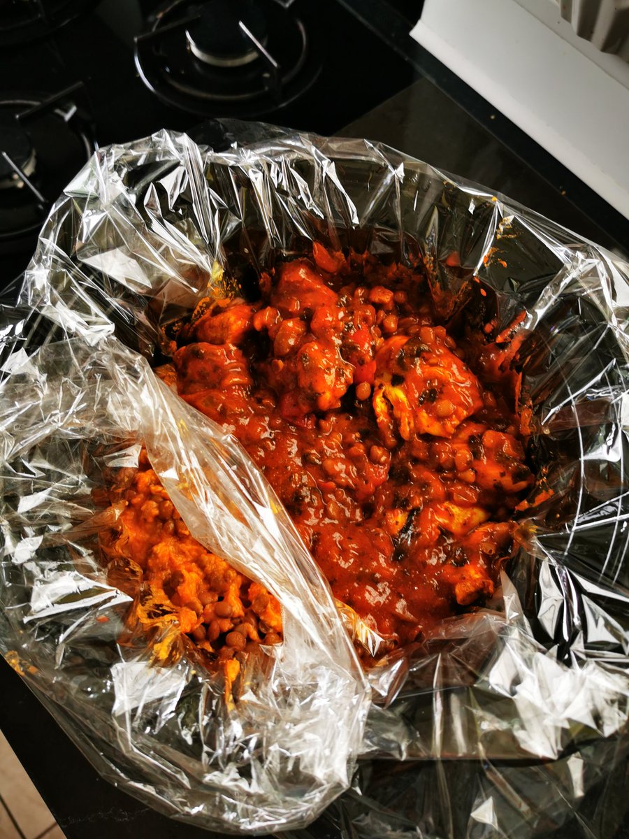 Slow cooker hack. Chicken saag and butternut squash and lentil korma in the same pot using a slow cooker liner and a roasting bag. Best bit is no washing up