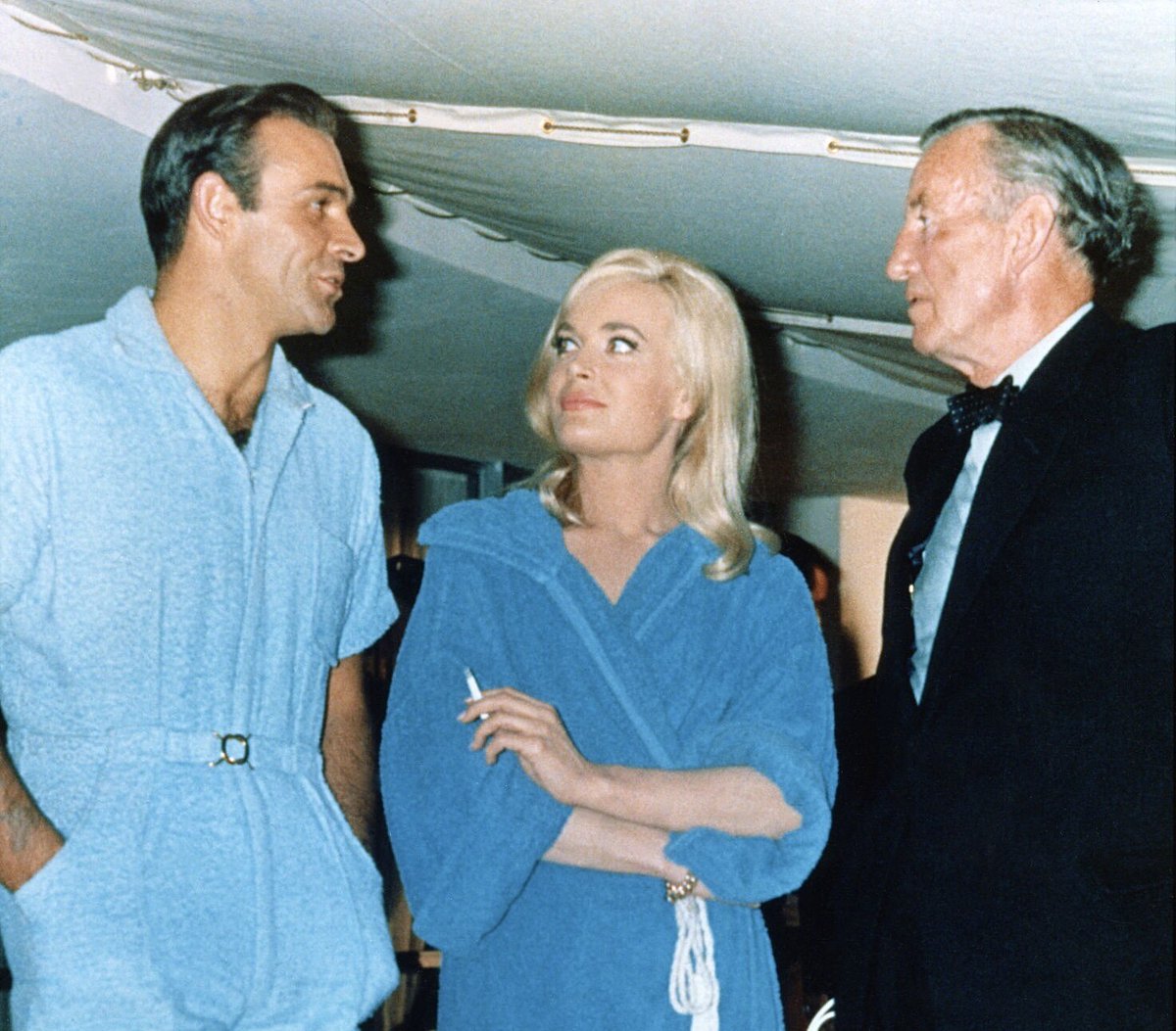 Ian Fleming photographed here with Sean Connery and Shirley Eaton on the set of “GOLDFINGER” (1964) at @PinewoodStudios