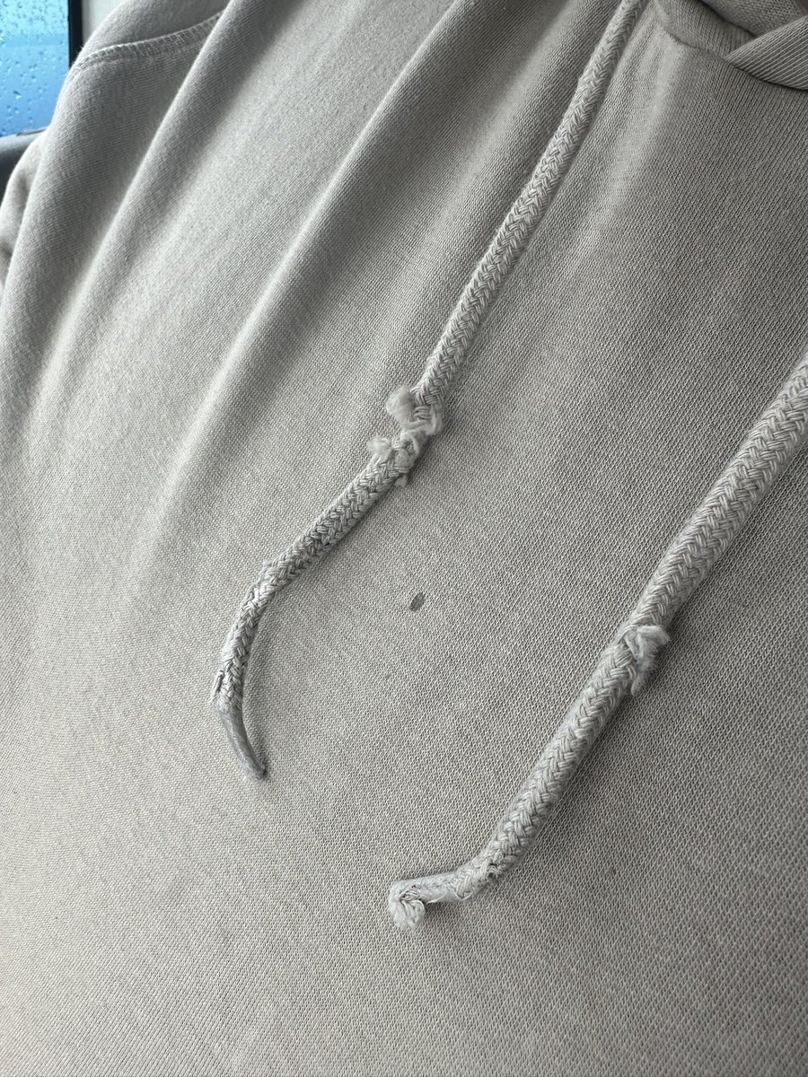 VikiDanv's tweet photo. @Jacamo my partner bought this hoodie last week, we have just washed it this morning and this has happened to the cords… never seen this happen to a hoodie before, please could we speak to someone about this? https://t.co/fiwpG2dJAy