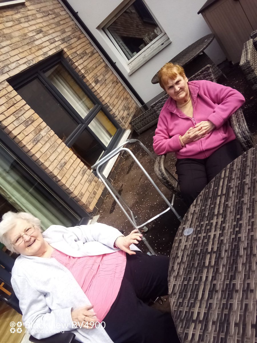 resident enjoying the new patio area in a rare dry day. #careaboutcare #SocialCareStars #SocialCareCampaign