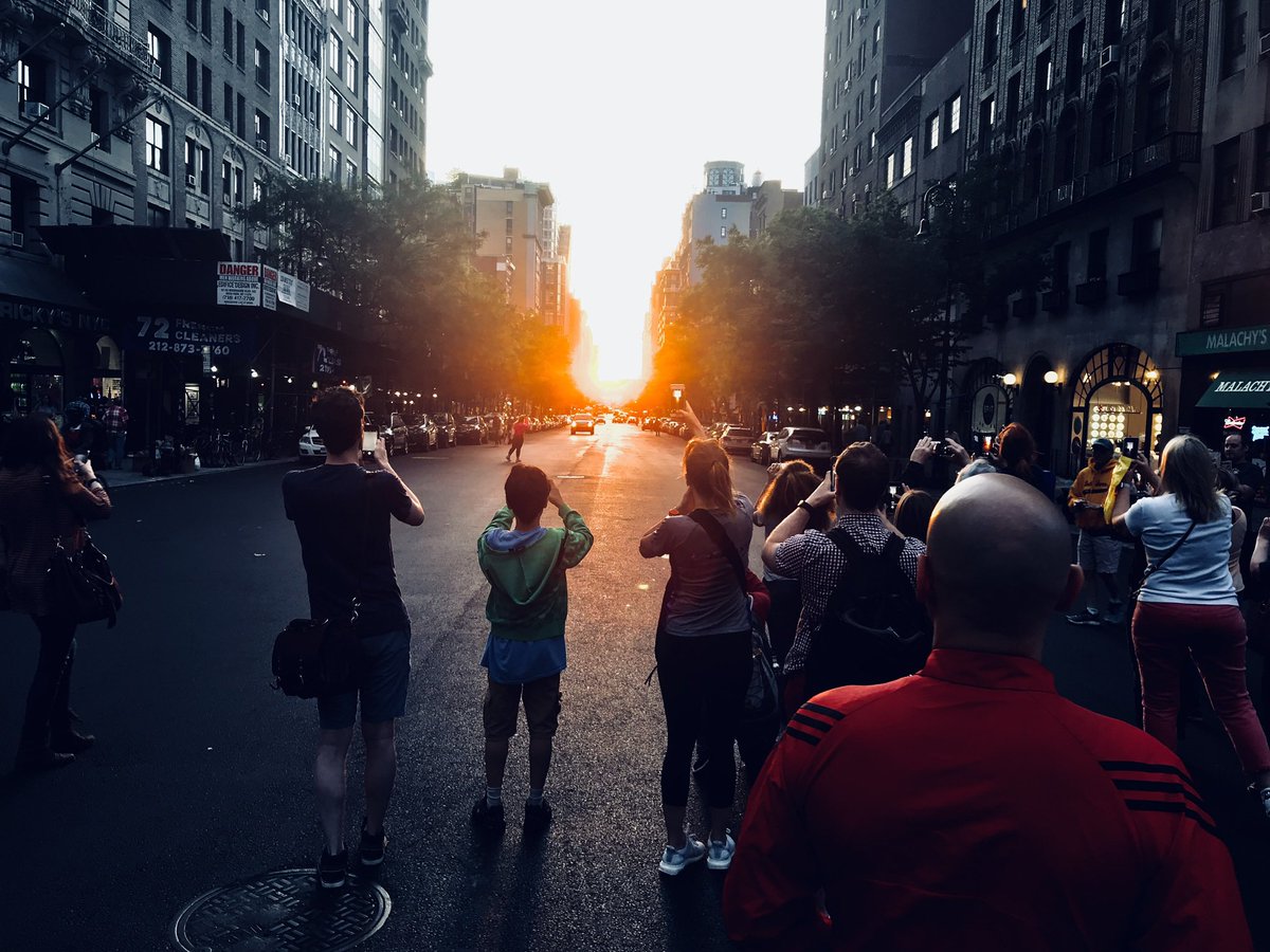 Today is the official start of #manhattanhenge season! Get your cameras ready as the day is looking gorgeous. The sun will set far enough north today that it just kisses the grid of the city before setting. It lights up the concrete jungle in perfect golden hour colors. @AMNH