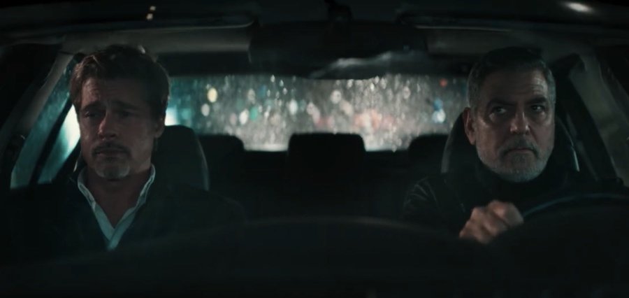 Brad Pitt & George Clooney in Wolfs trailer door Jon Watts