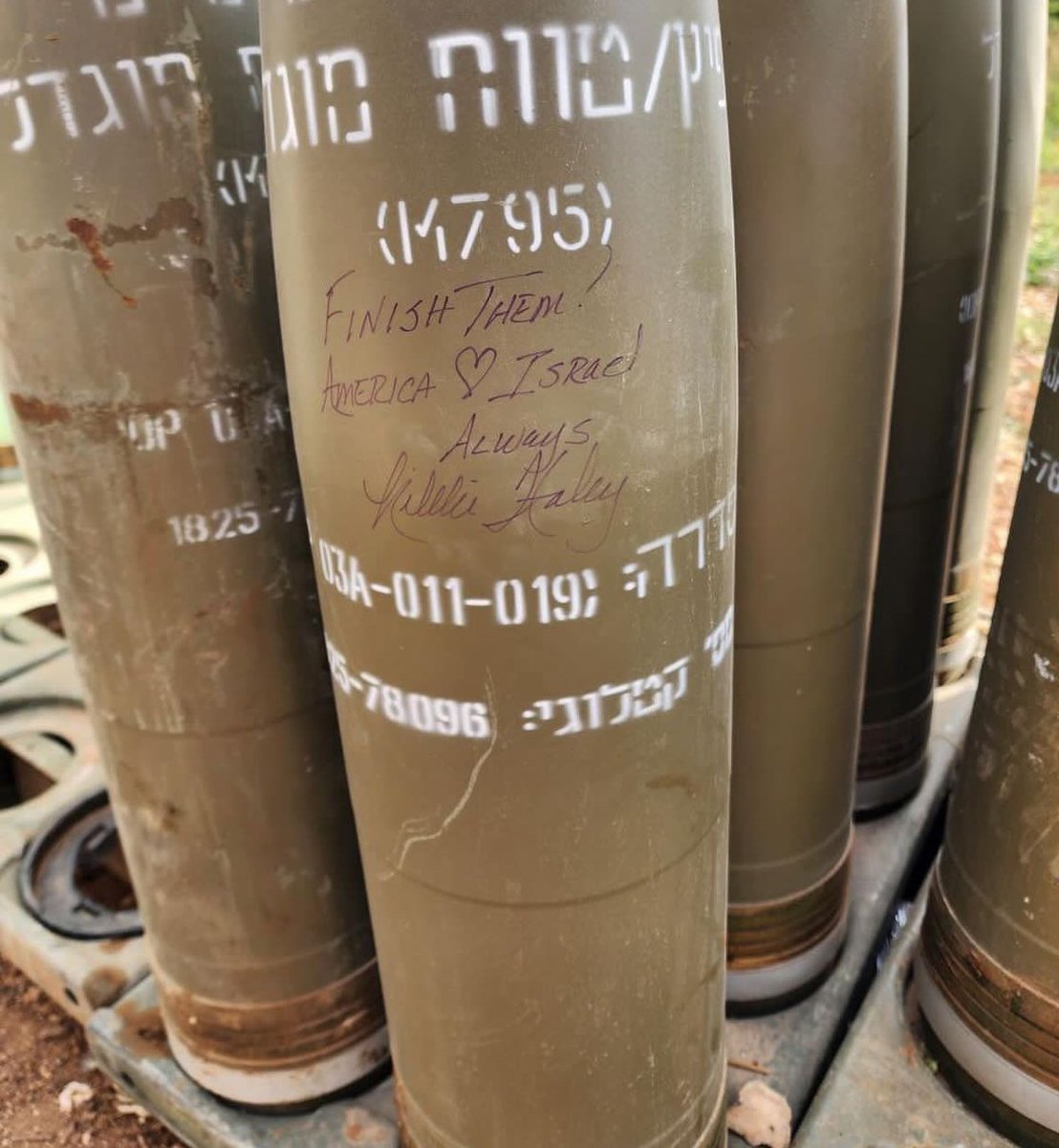 Here ⁦@NikkiHaley⁩ signs Israeli ammo with a personal inscription.