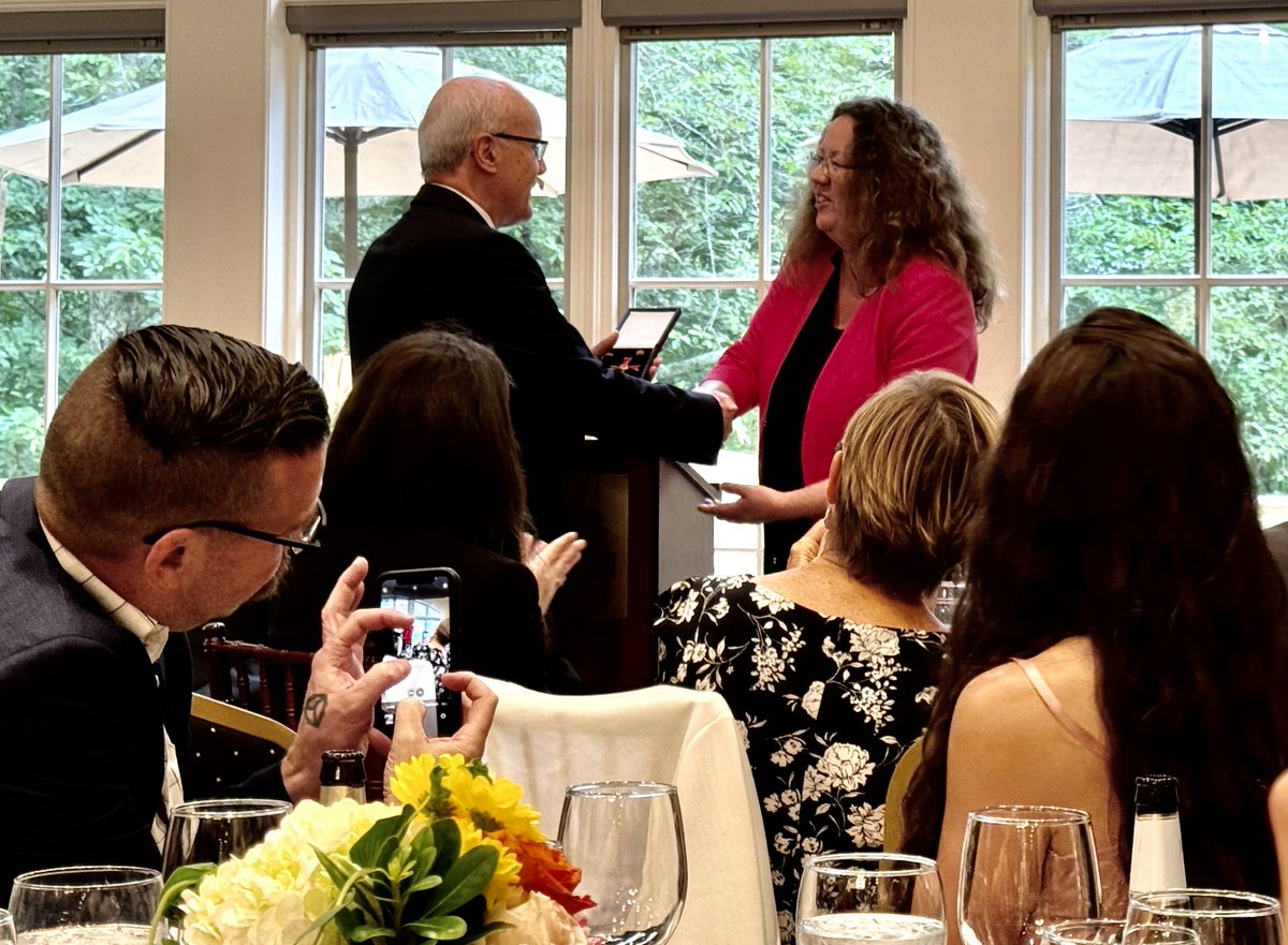 Dr. Eike Jordan received the Officer's Cross of the Order of Merit from Consul General Melanie Moltmann on behalf of the German Federal President during a dinner at The Halle Foundation in recognition of his remarkable contributions to the German community over many decades.