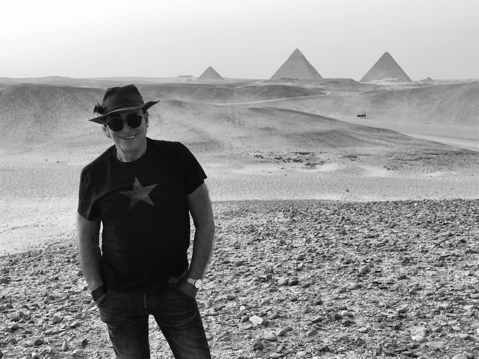 Mama_Hooch's tweet photo. #ThaaoTuesday One of my favorites of @ThaaoPenghlis in his happy place. So Thaao. Relaxing by the Pyramids with a smile and that HAT! #Egypt #timetoreturn #Journeys #PLACES https://t.co/FnxtzNcC1i