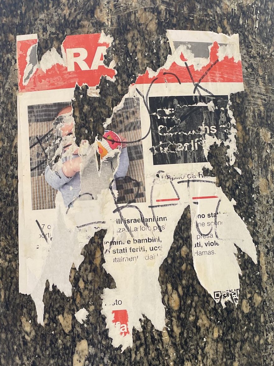 Poster of kidnapped Israeli baby Kfir Bibas, 1, gets DESTROYED and covered in “F*** Israel’ graffiti in Turin, Italy.