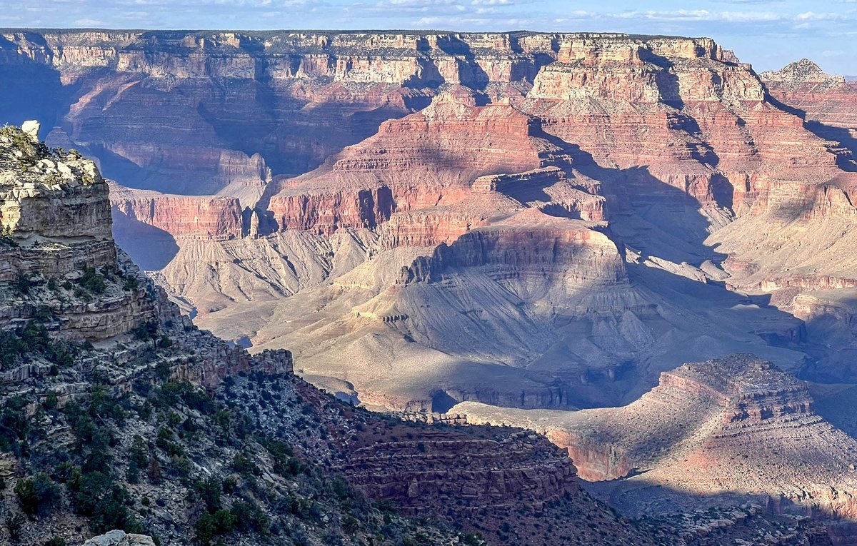 Grand Canyon is considered one of the natural wonders of the world largely because of its natural features. 

Exposed geologic strata, layer upon layer, rise over a mile above the river, representing one of the most complete records of geological history.