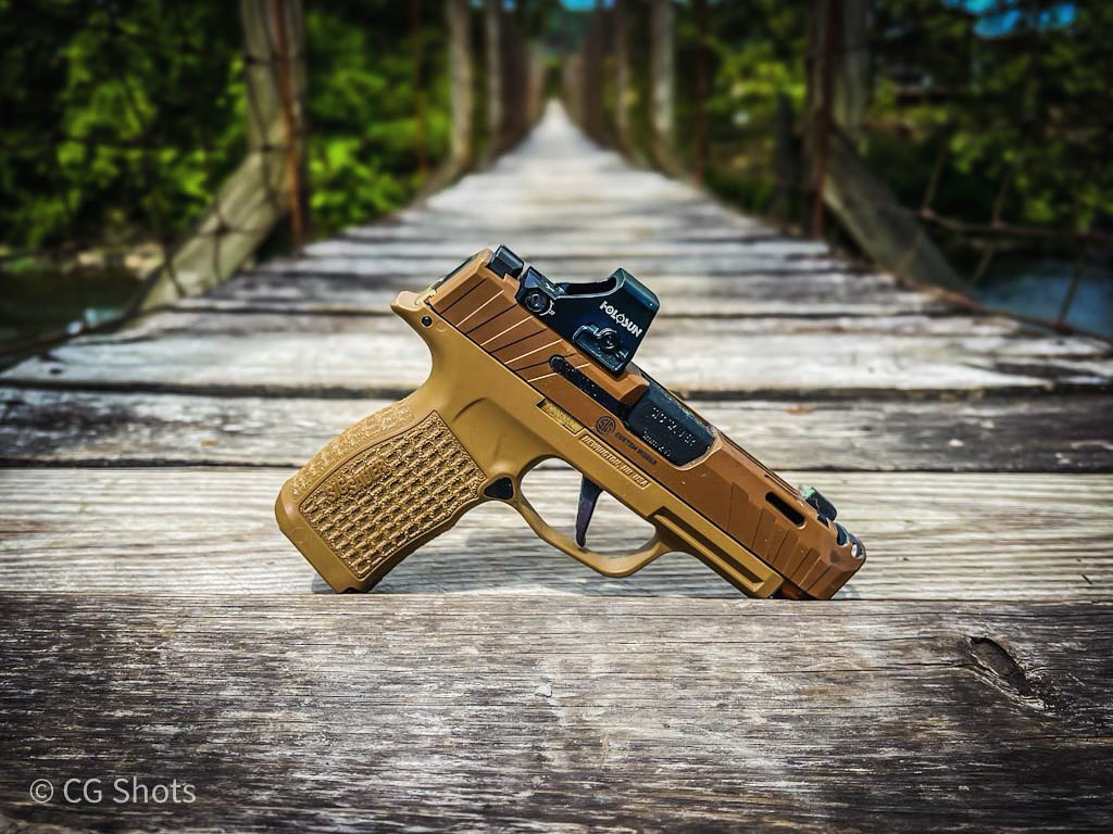 This little fella has went everywhere with me the past couple of months. It’s one heck of a pistol! #sigsauer #p365xl #holosun #brownells #brownellsinc #bureauofpropaganda #edc