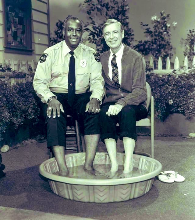 WE NEED MORE PEOPLE LIKE Mr. ROGERS❗️ In 1969, during a period when African Americans were often barred from sharing swimming pools with white people, Mr. Rogers chose to invite Officer Clemmons to cool his feet in a pool with him, challenging a widely recognized racial