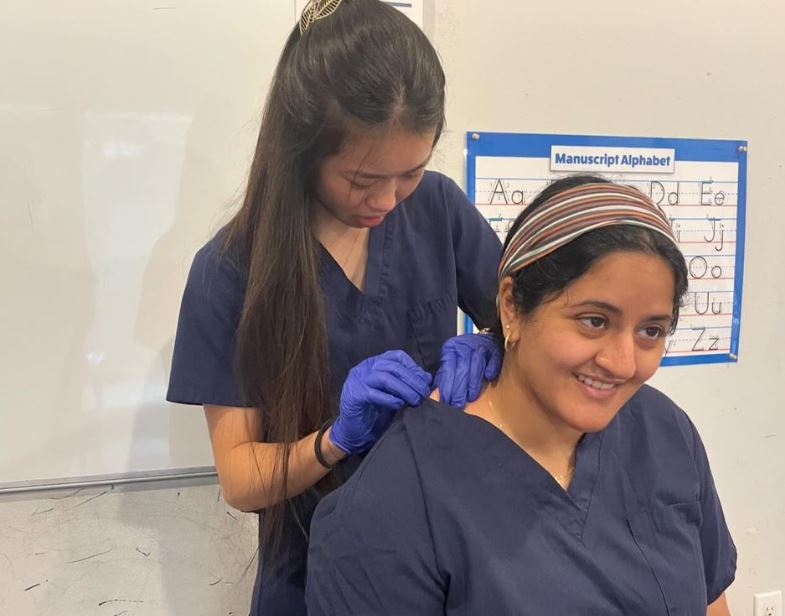 The semester's final Refugee Health Initiative clinic brought one last chance for #TCOM students to practice their OMM skills on back and neck pain cases. Dr. @yein was there to guide and teach them. We are so proud of all the students who volunteered this year. Terrific work!