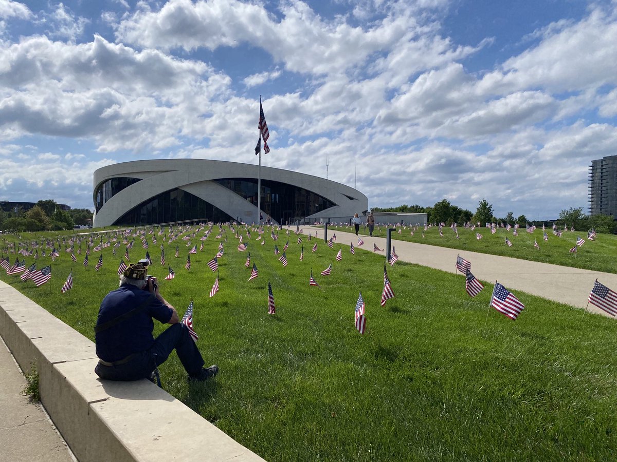 A Vietnam veteran takes photos of American flags put out for Memorial Day at the National Veterans Memorial and Museum in Columbus, Ohio. #columbus