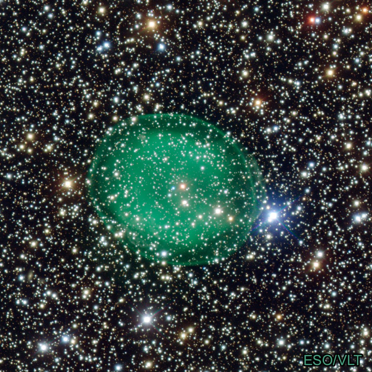 Today Chandra is studying a supernova in Scutum. Nearby in the sky is IC 1295, a planetary nebula located about 4,000 light-years from Earth. Different chemical elements glow with different colors. The emerald green glow of IC 1295 is due to the presence of ionized oxygen.