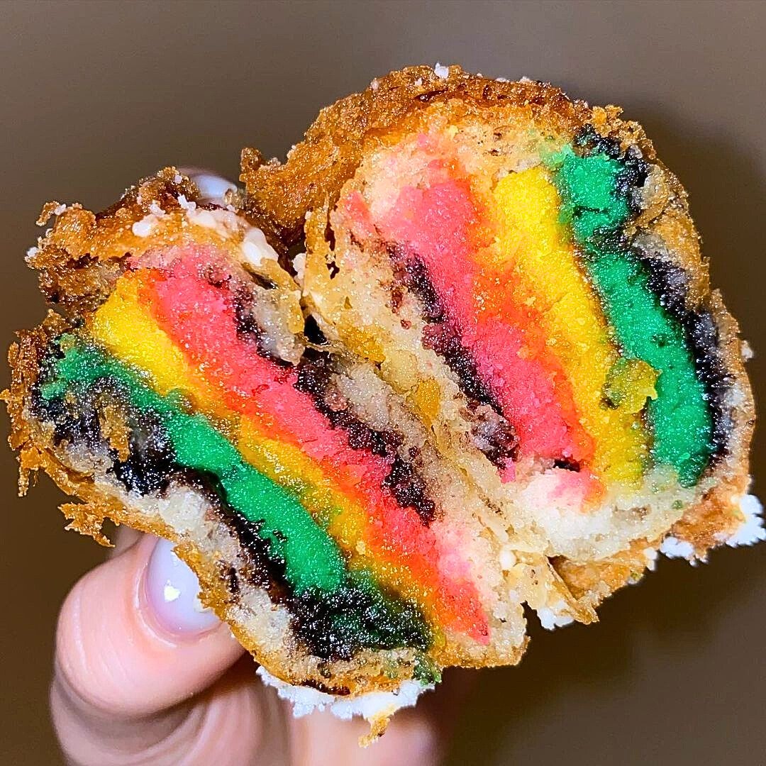 Who wouldn't love these fried rainbow cookies? 🌈🍪 A colorful twist on a classic, crispy on the outside and soft on the inside. 😋   📸 @li_foodfinds  #FamousFoodFestival #emilyapplepuffs #friedrainbowcookies #foodie #foodporn #dessertlover #longislandfood #foodstagram