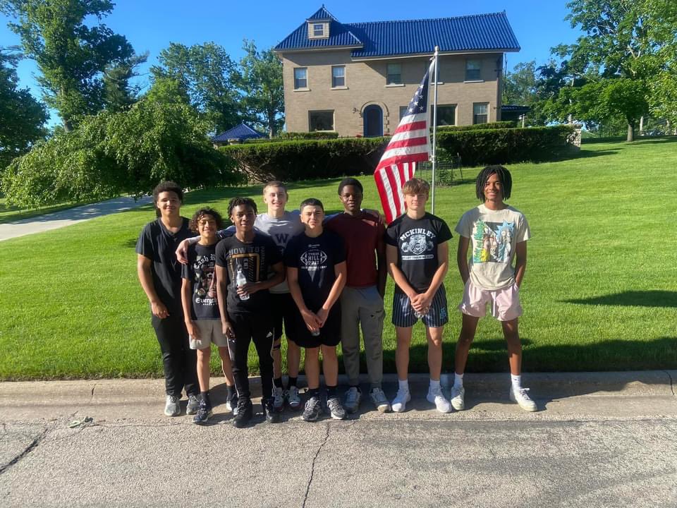 WashBasketball's tweet image. We spent yesterday putting flags up for families in our community. So proud of these young men for helping out!