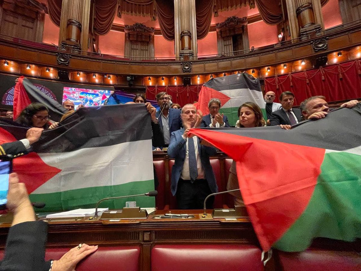 BREAKING:

Palestinian flags waved in the Italian Parliament today.