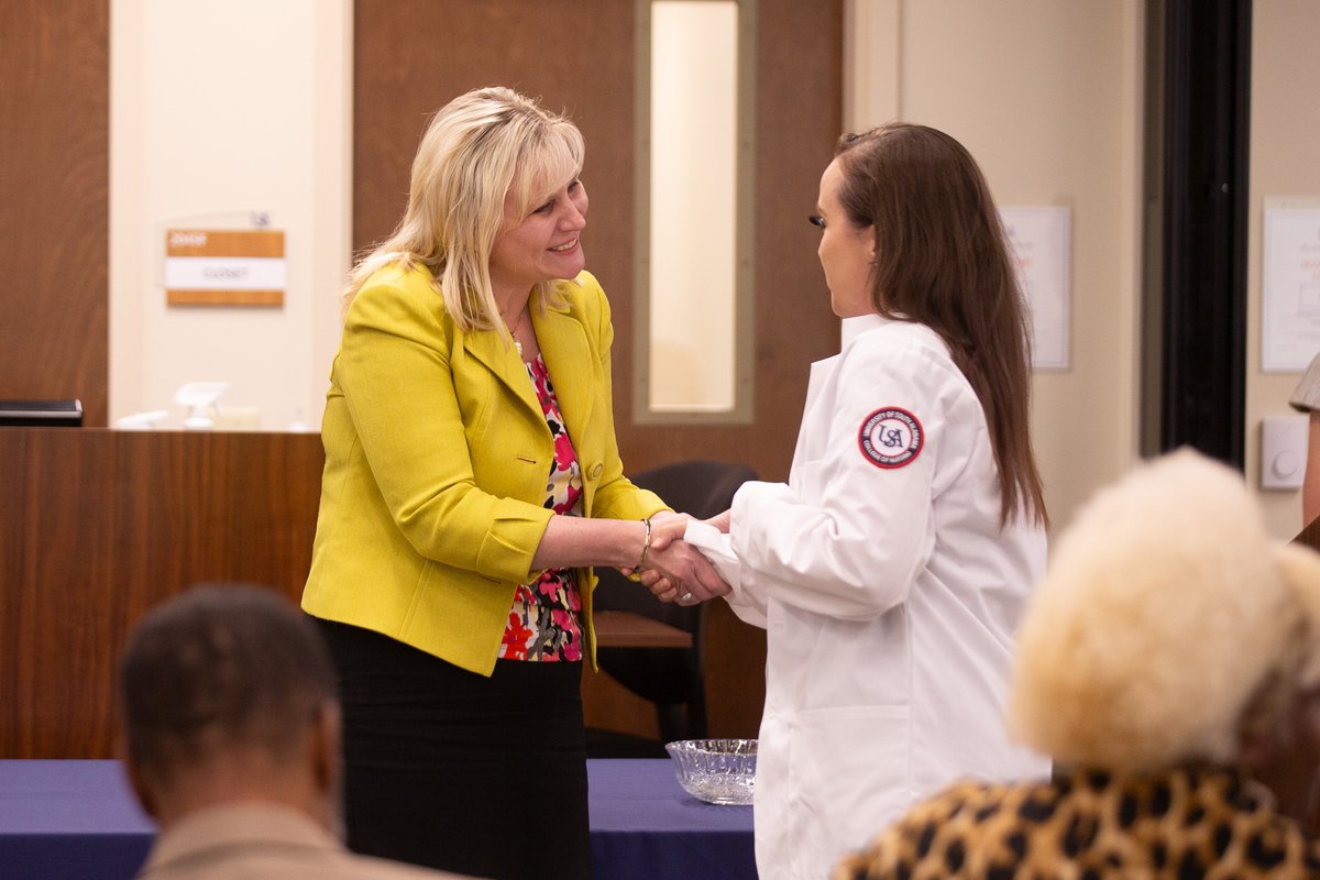 USACONursing's tweet photo. History was made on May 7 when the USA College of Nursing presented the first cohort of students in the LPN to BSN Pathway with their white coats. 🩺 #SouthAlabamaNursing 

Learn more: https://t.co/F2EVS4ppHJ https://t.co/eDQUX7x5e6