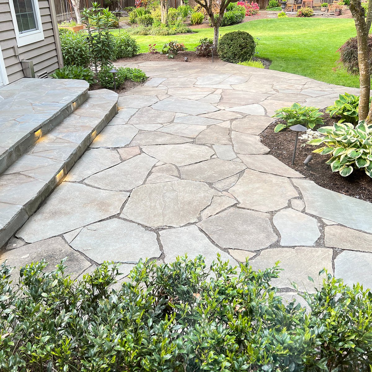 Leveled and repaired the stone patio with 2,400 lbs of new stone.