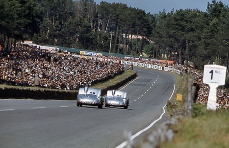 Le Mans 1955 Pierre Levegh followed by Karl Kling. Two Mercedes Benz 300SLRs on the descent from Dunlop Bridge to the Esses. The two Mercedes have their air brakes up,to assist their braking. It was not long after this photograph was taken that Kling overtook Levegh and