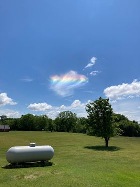 Lori sent me this cool picture of a unique rainbow cloud in Birch Run, Michigan. Did anyone else see it?