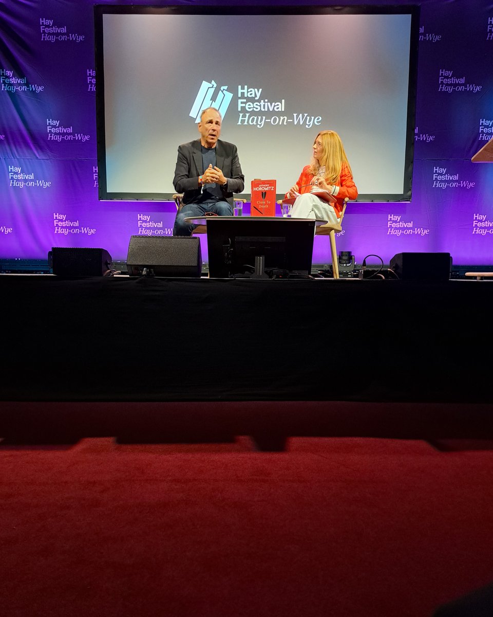 Some students attended a show featuring @AnthonyHorowitz talking to @JuliaWheeler1 at @HayFestival. Their front row seats sparked interaction throughout the show, and fan Jack got to chat with Anthony even during the talk! Massive thanks to Nina, Nigel and Eliot for taking them!